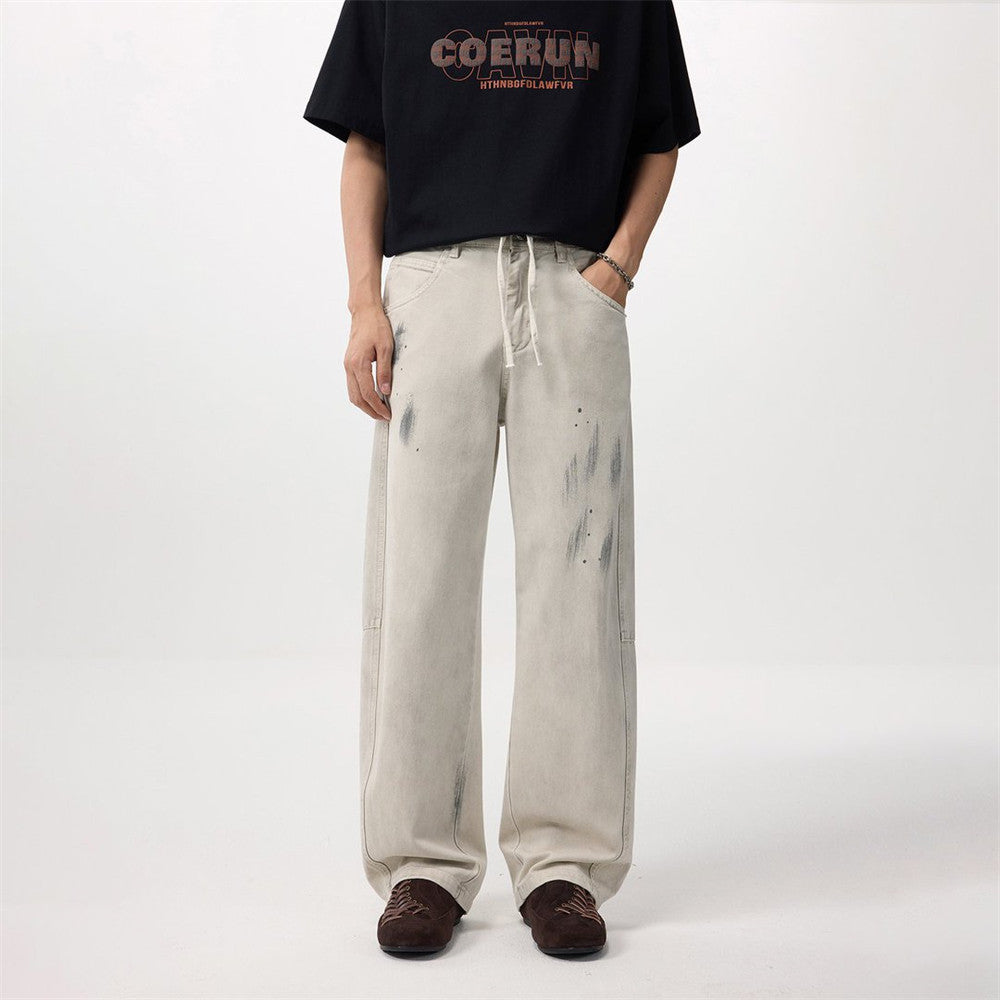 Paint graffiti make old dirty straight leg jeans